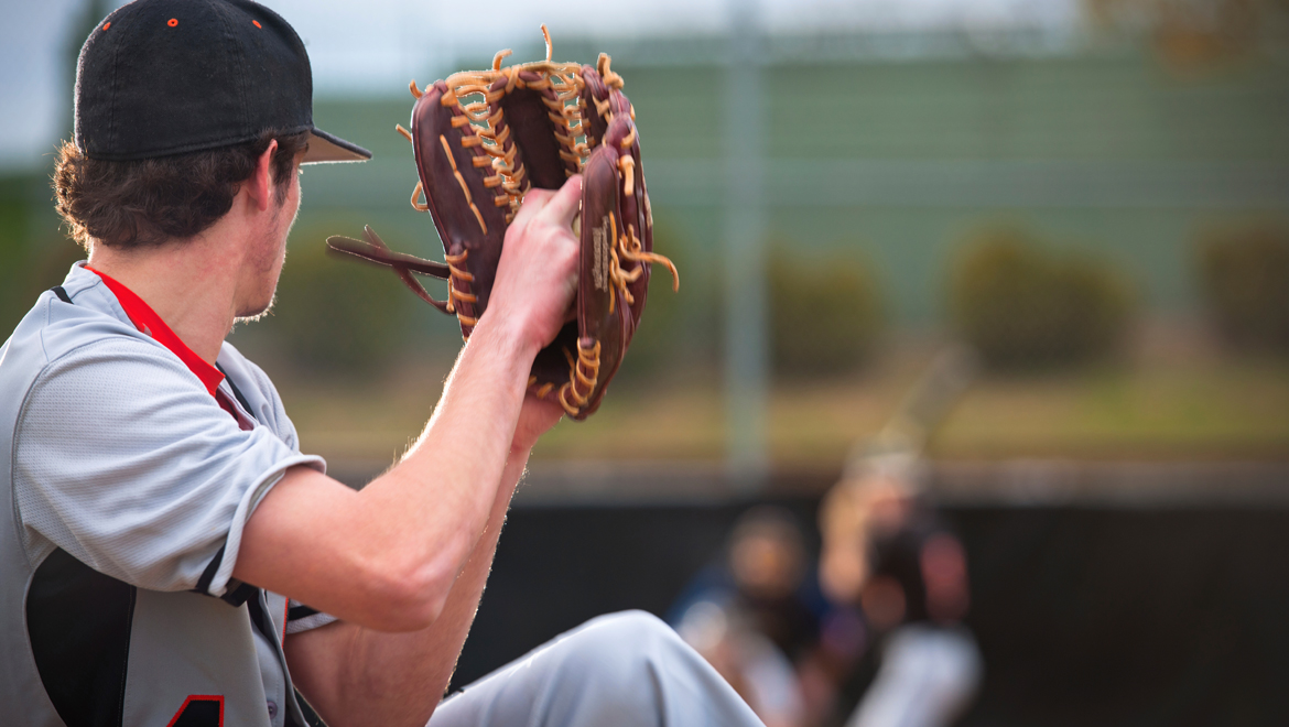 Man pitching a ball