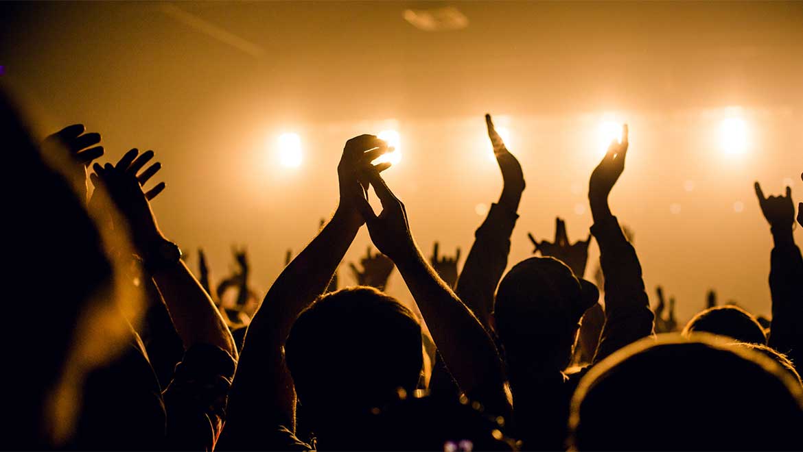 Crowd cheering at a concert