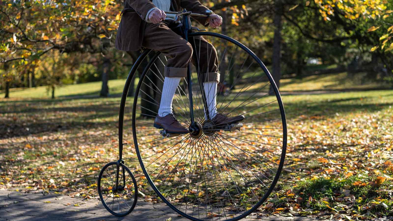 Penny farthing bicycle rider