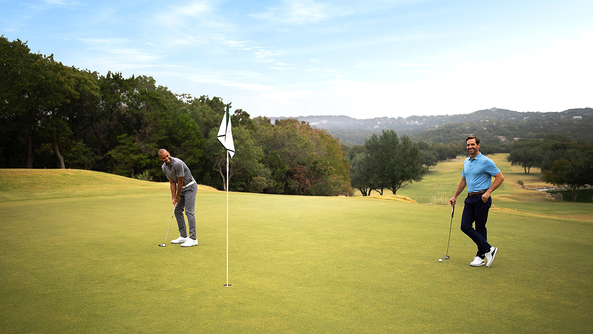 Two men on putting green