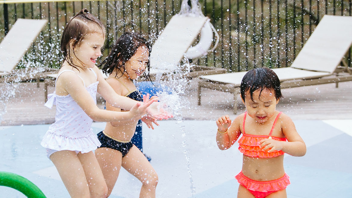 Children playing in splash pad.