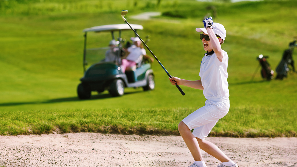 Child playing golf