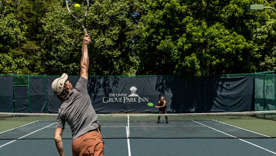 tennis court man serving