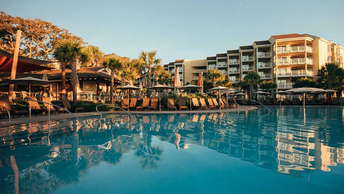 Omni Hilton Head pool view at sunset.