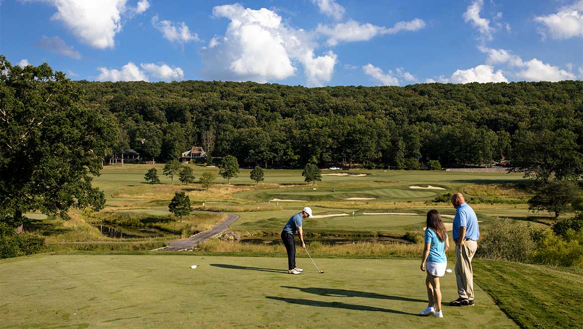 Group of friends playing golf