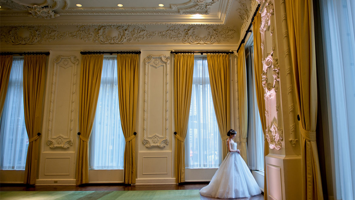 King Edward Hotel in Toronto bride looking out the window 
